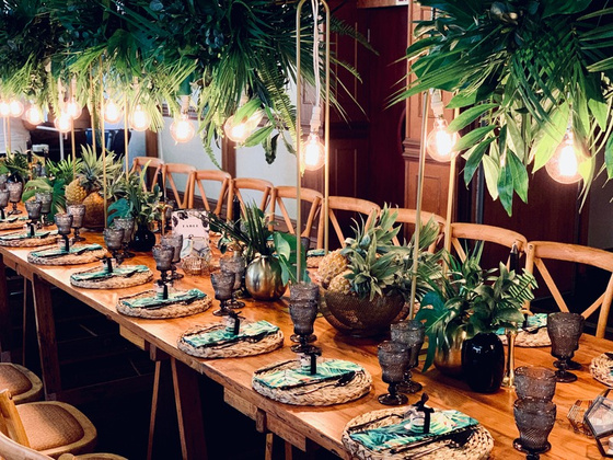 Tropical themed banquet table styling